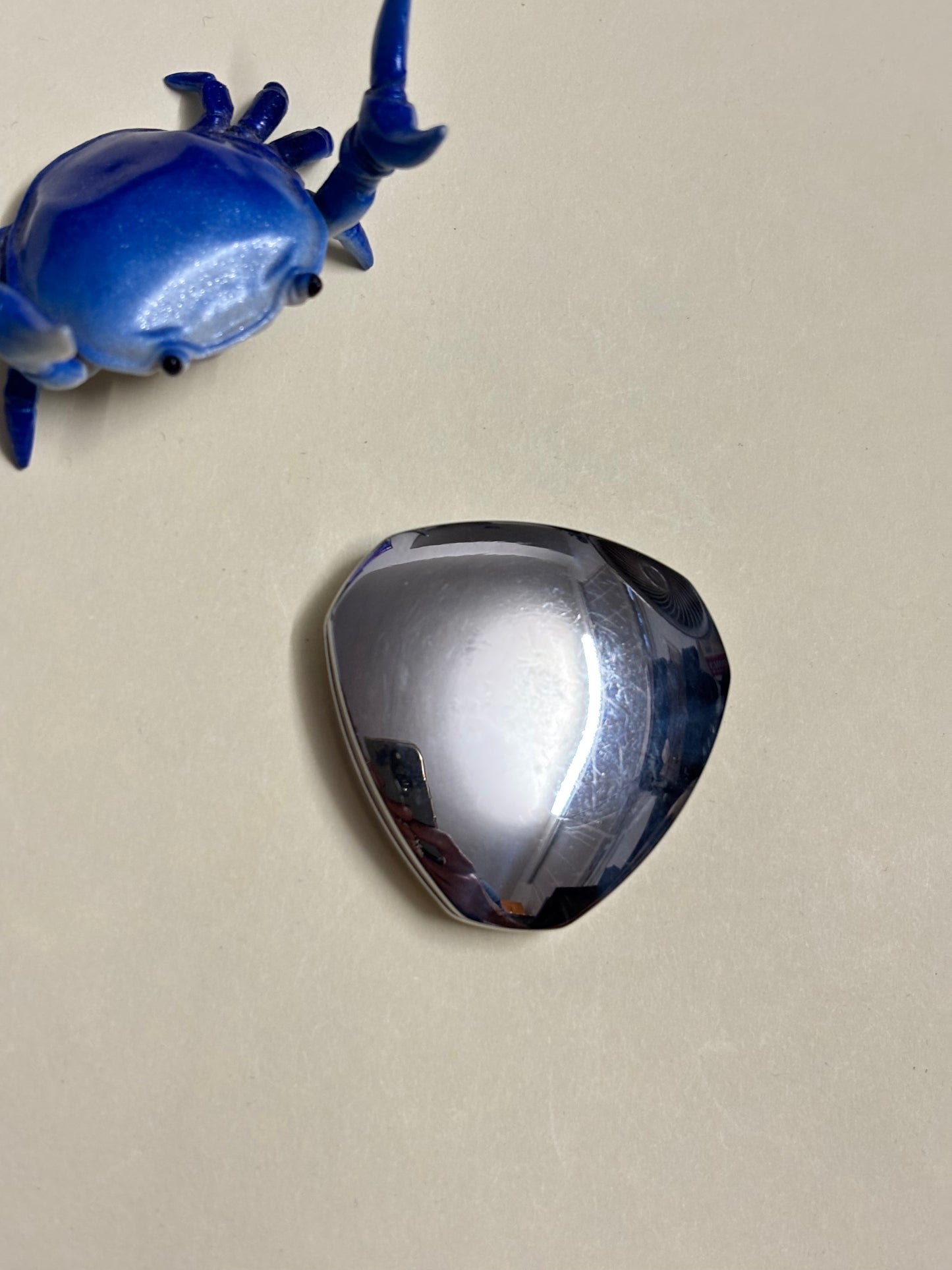 Indx Fluxx - ss - haptic coin - fidget toy