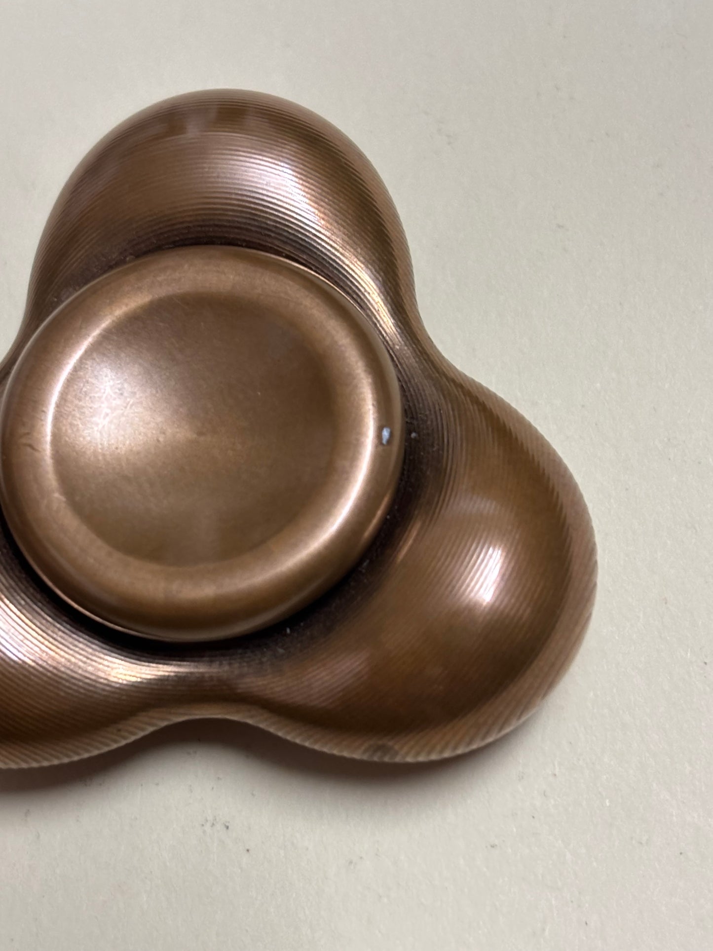 KAP - Cell tri bronze spinner - fidget toy