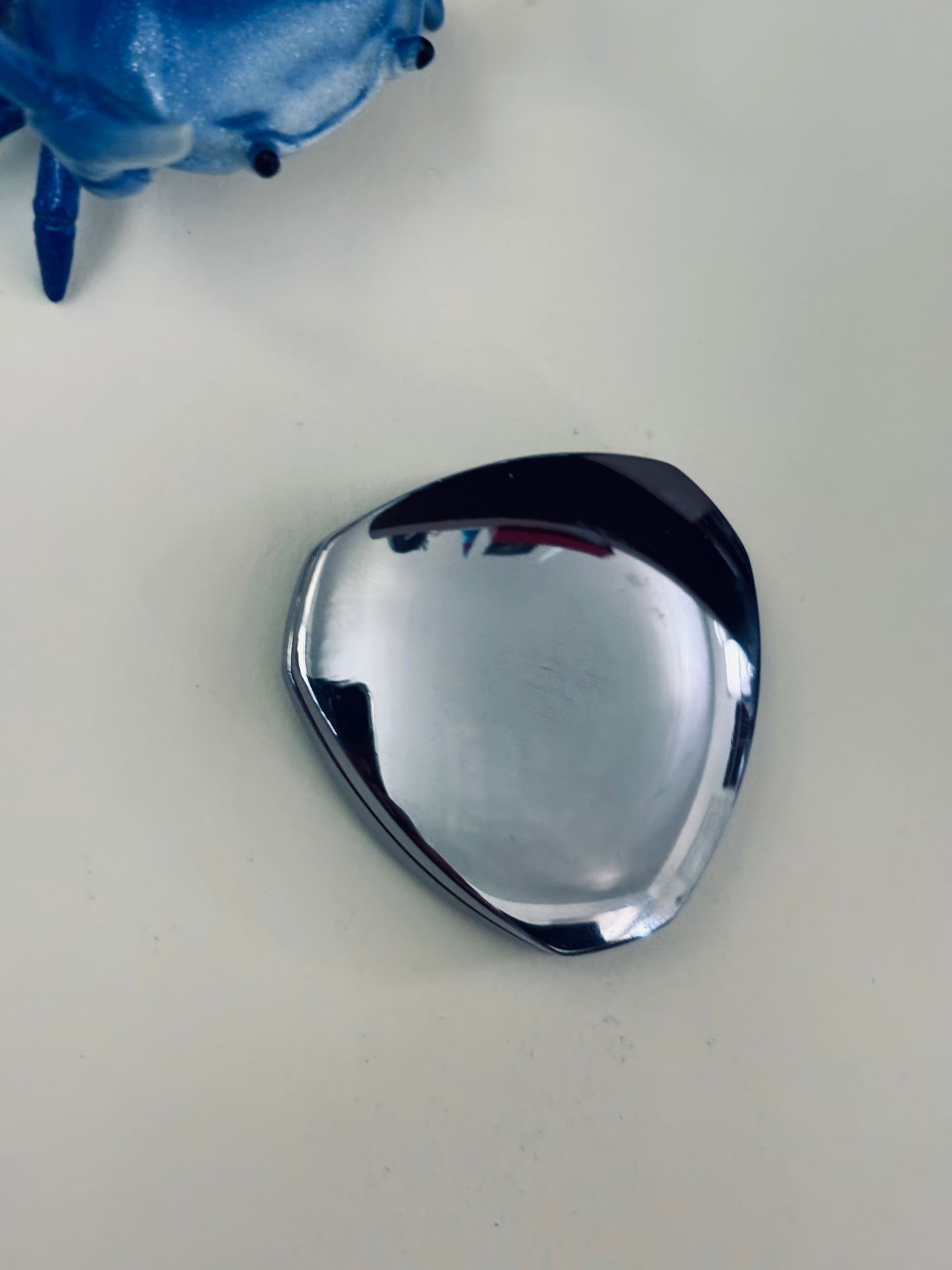 Indx Fluxx - ss - haptic coin - fidget toy