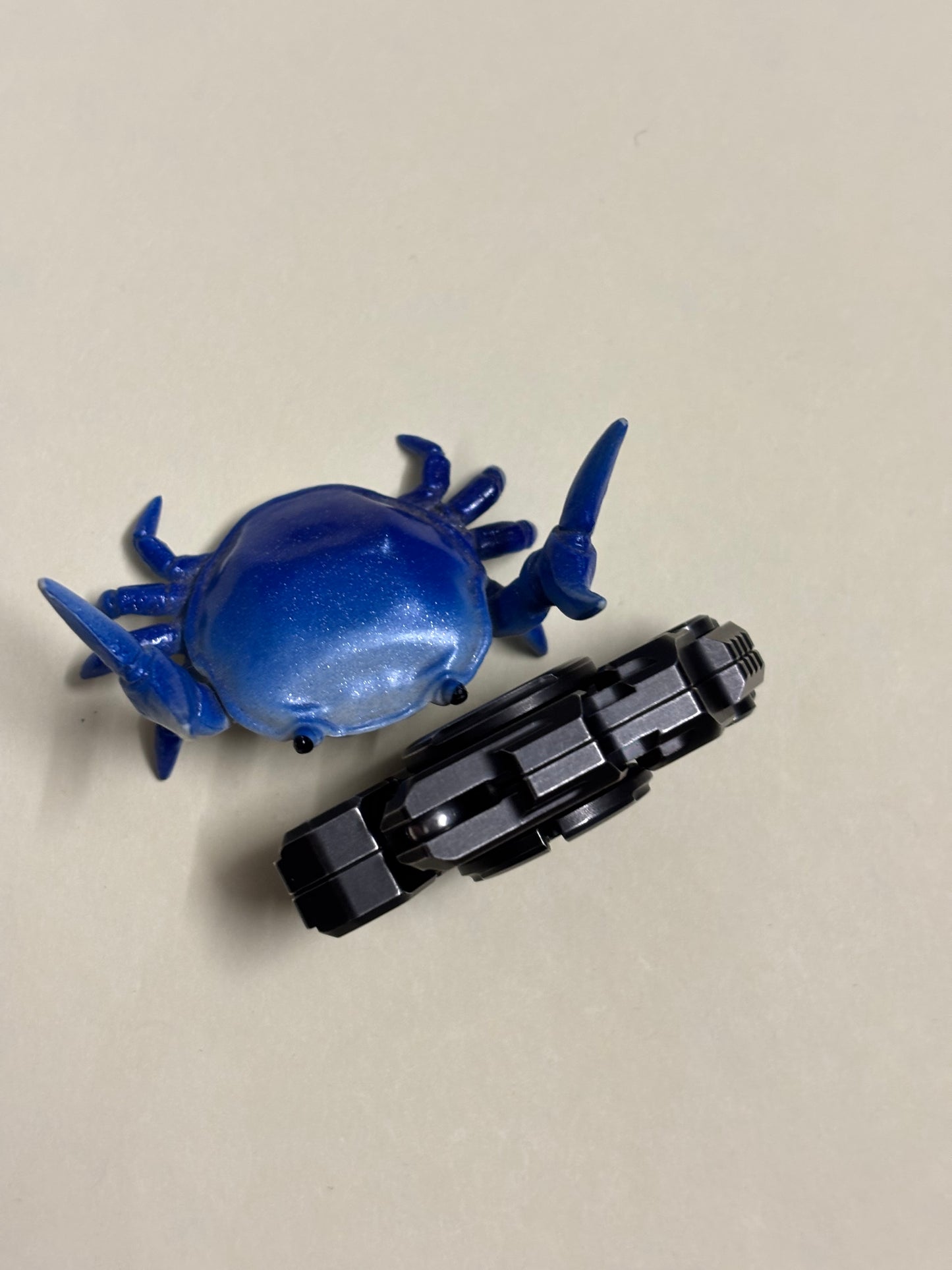 Mackie robotic arm distressed SS spinner - fidget toy