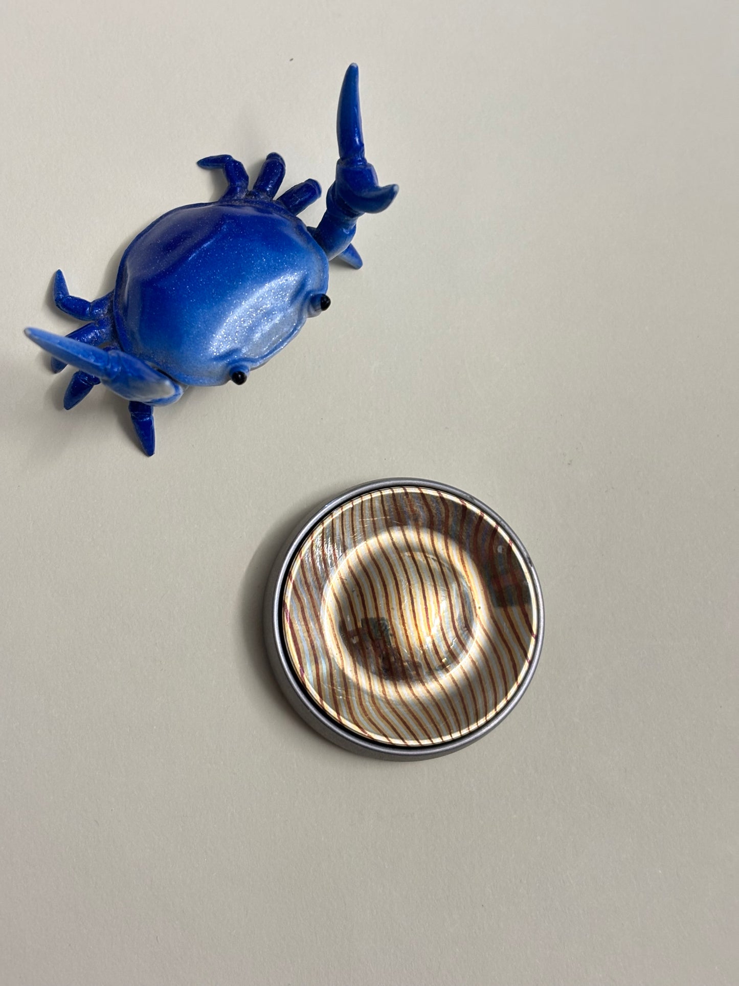 Umburry armored haptic coin - mid size speakerman mokume / TI - haptic coin - fidget toy