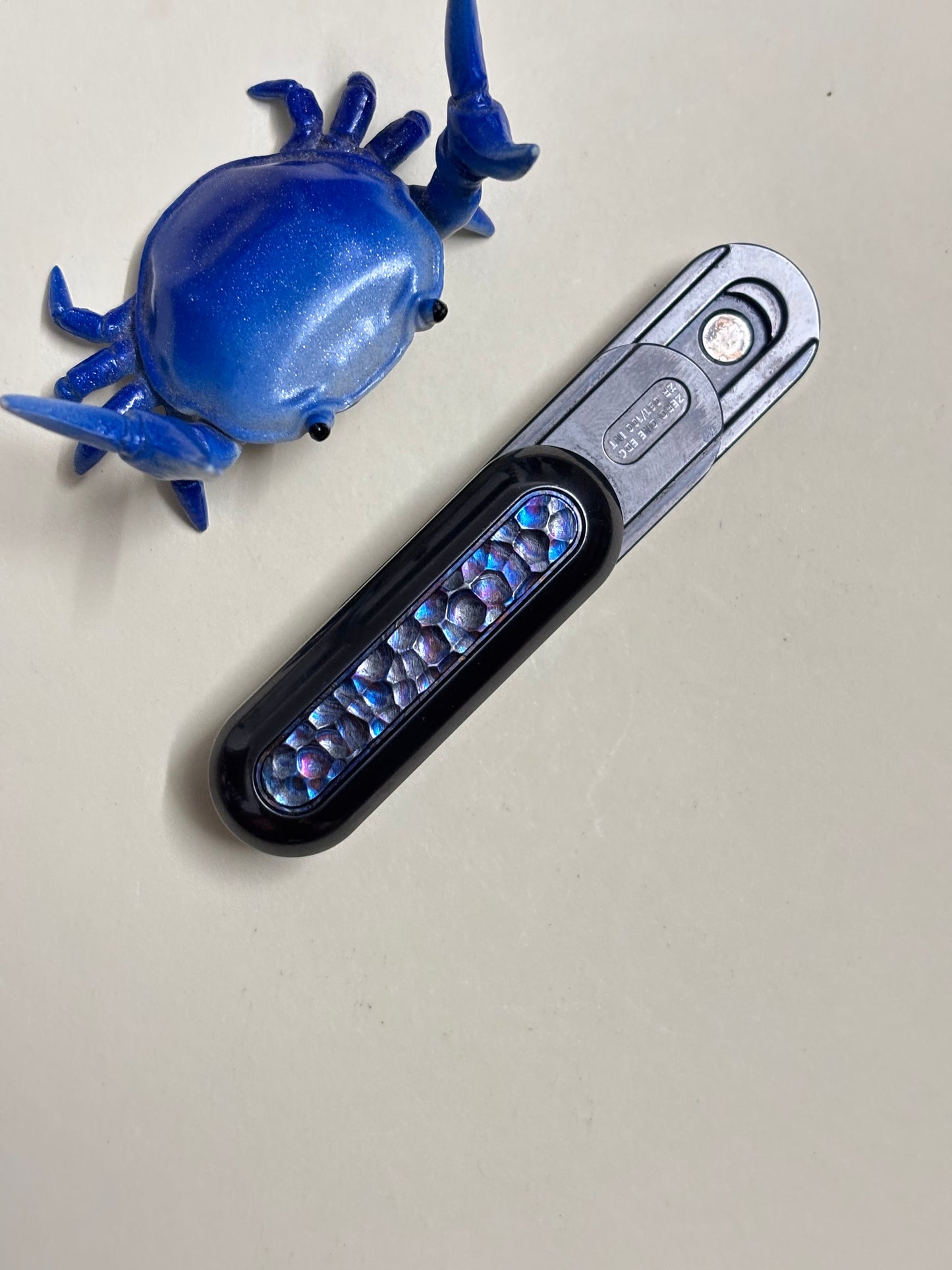 01edc - pod - L zirc/mokuti slider - fidget slider