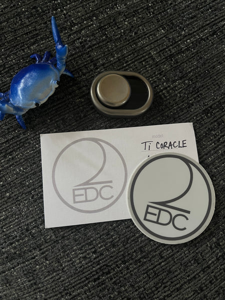 Two edc coracle - TI  - Fidget toy