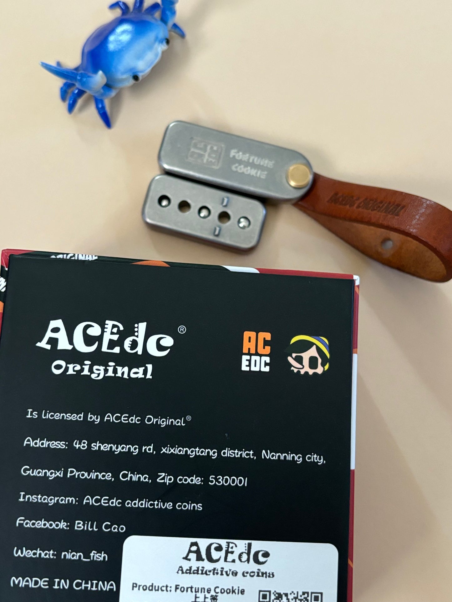 ACEDC fortune cookie in ti - fidget toy