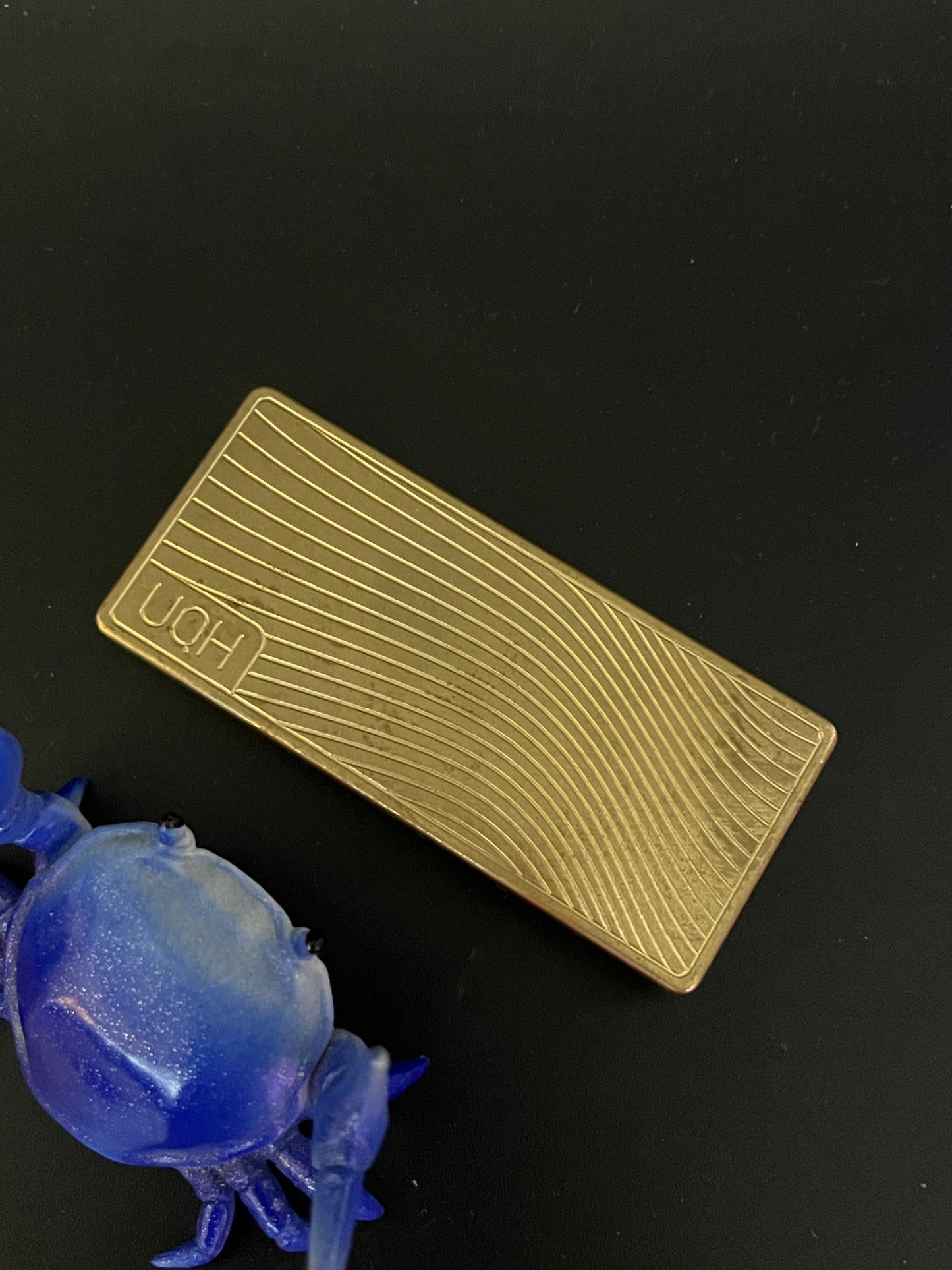 UQH - rocker plus in brass - Fidget toy