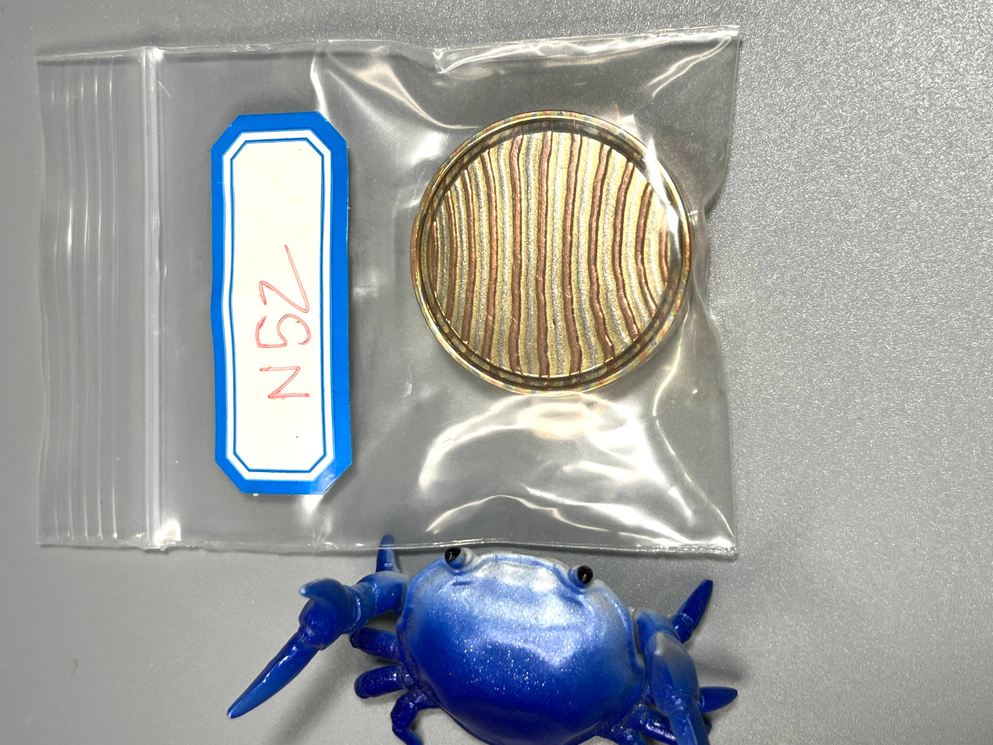 Umburry - etched mokume mid sized - haptic coin - fidget toy