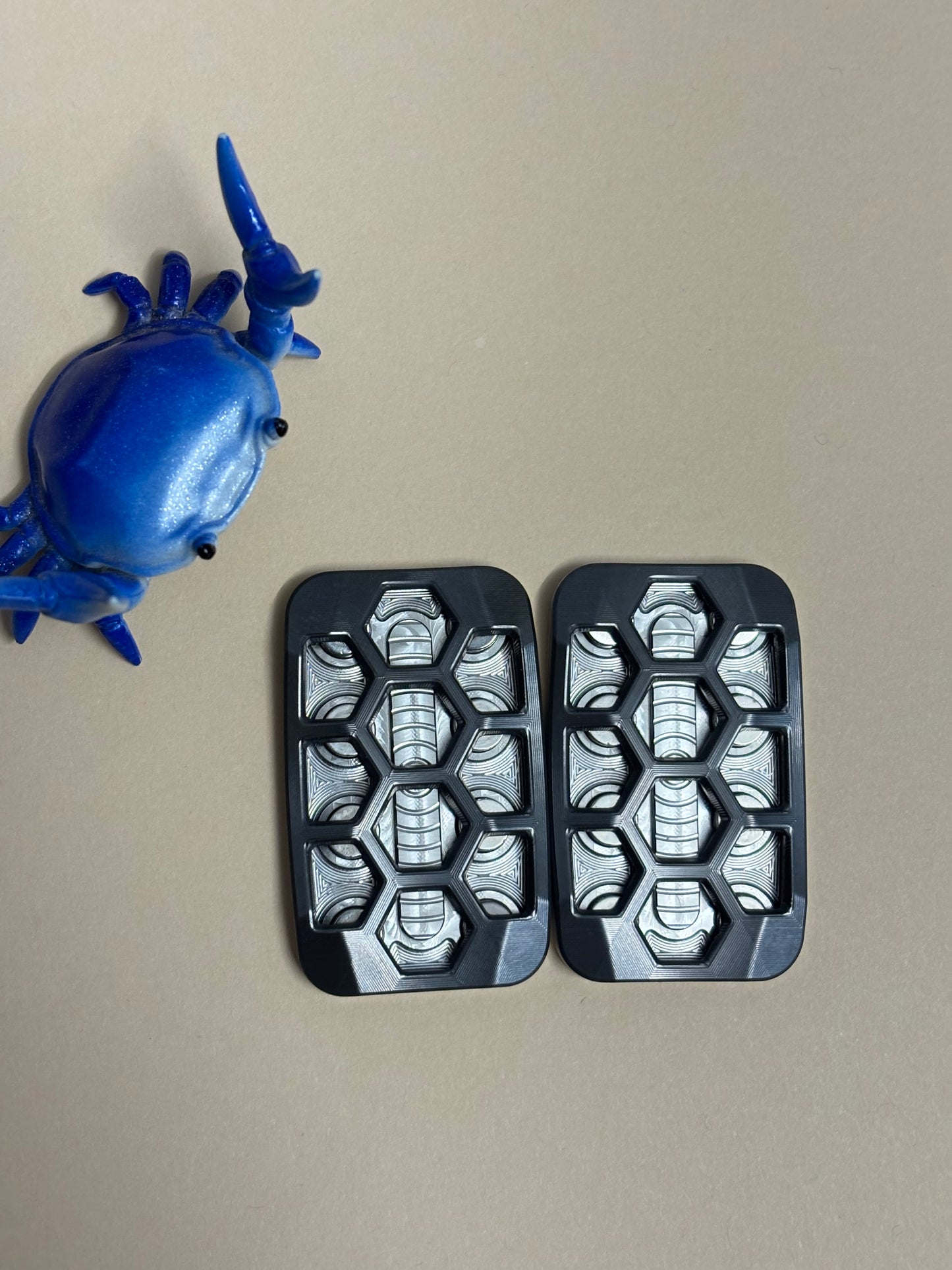 Magnus skelly hex squash toad - Zirc/SS- fidget toy