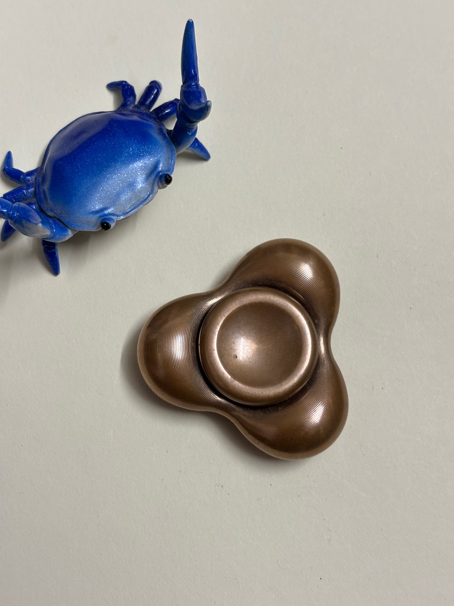 KAP - Cell tri bronze spinner - fidget toy