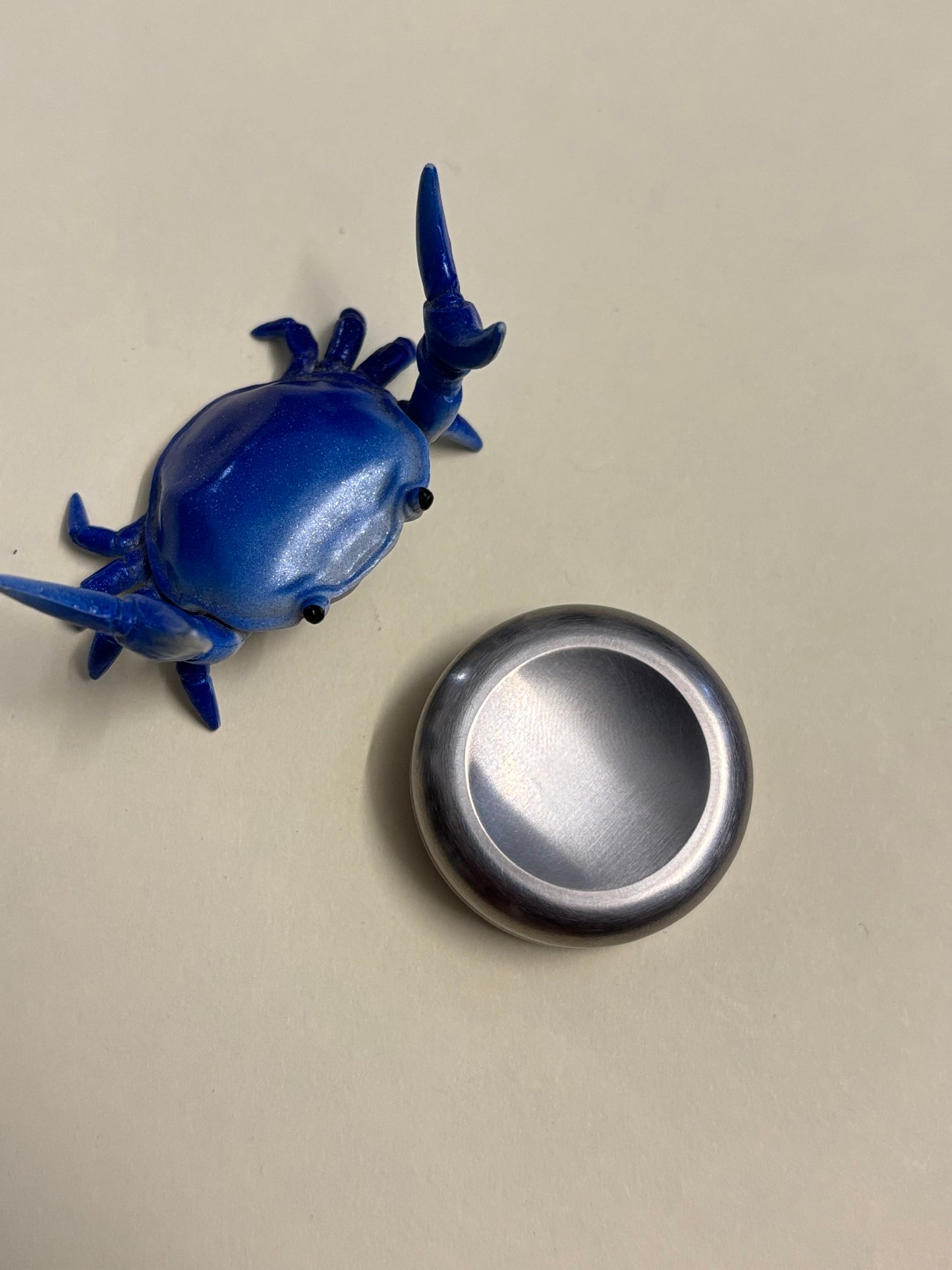 Umburry haptic coin - TI - haptic worry stone