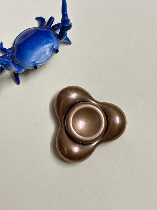KAP - Cell tri bronze spinner - fidget toy