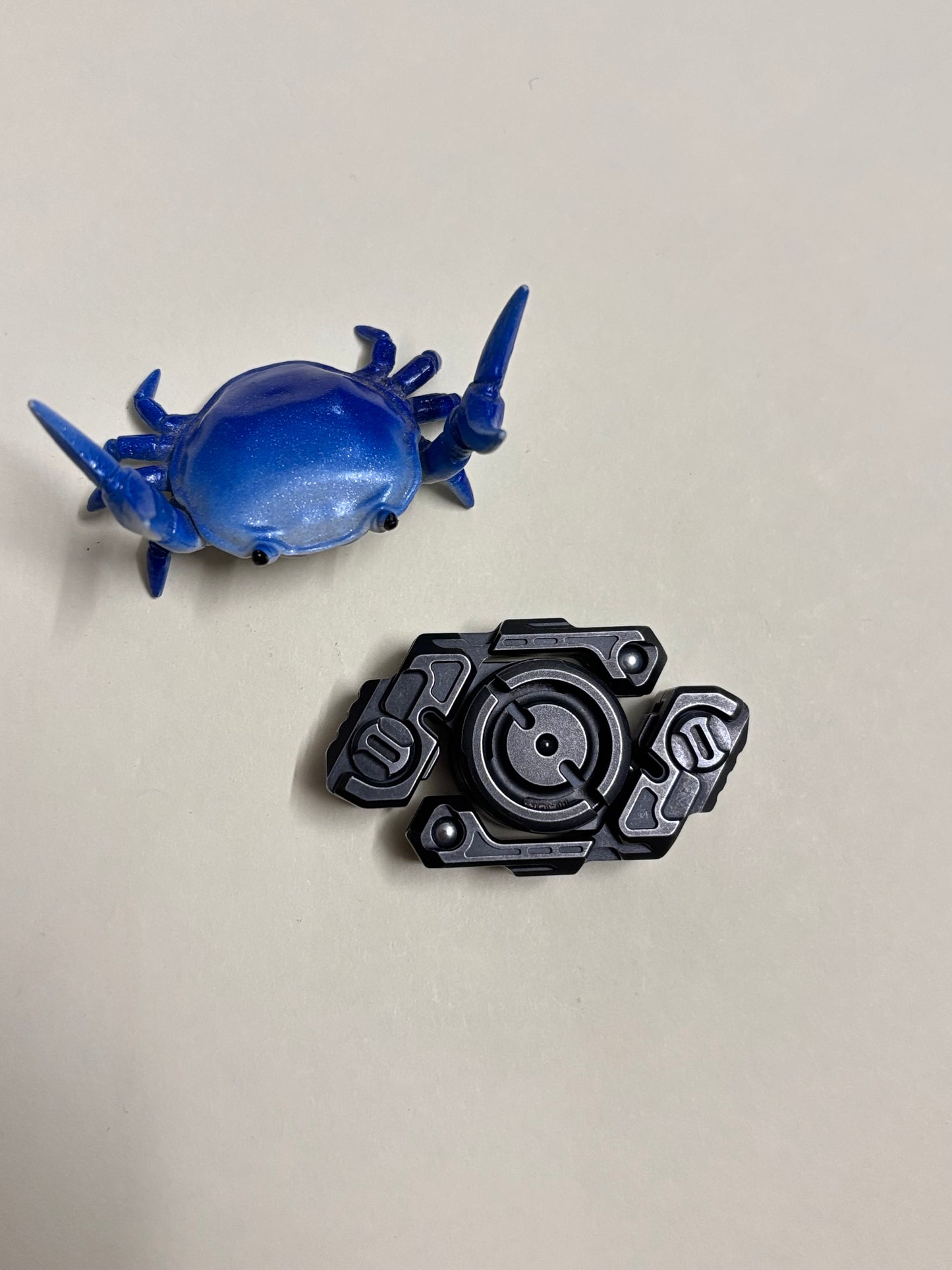 Mackie robotic arm distressed SS spinner - fidget toy