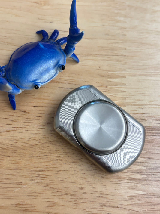 UQH - Pavilion - TI - fidget spinner - Fidget toy