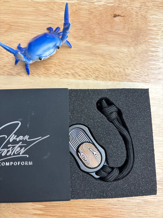 Compoform bean - damasteel gold anodized slider/ clicker - fidget toy