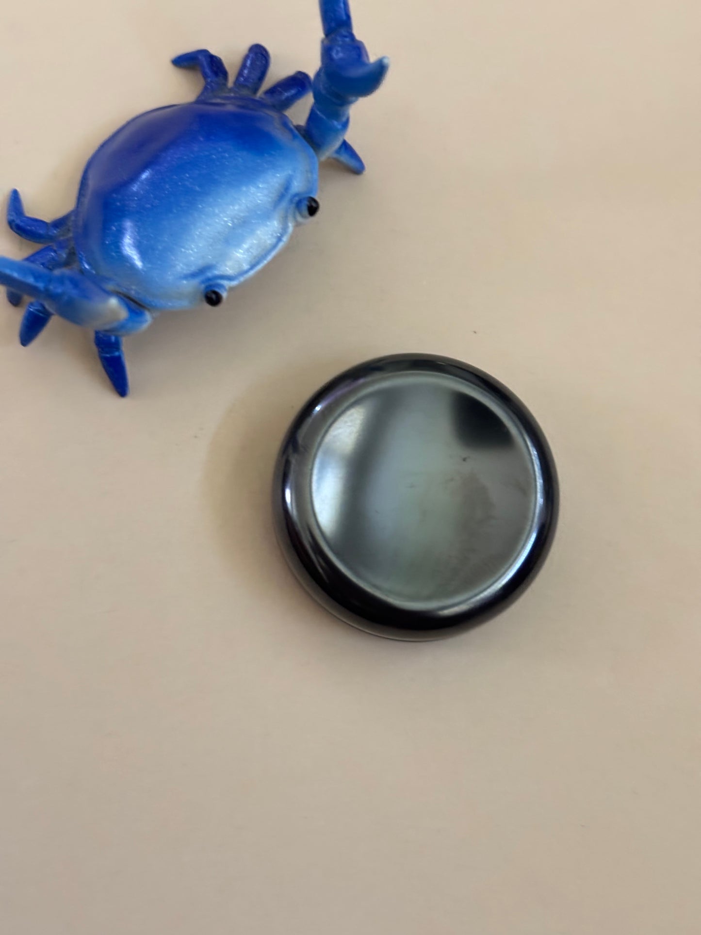 Umburry haptic coin - zirc - haptic worry stone