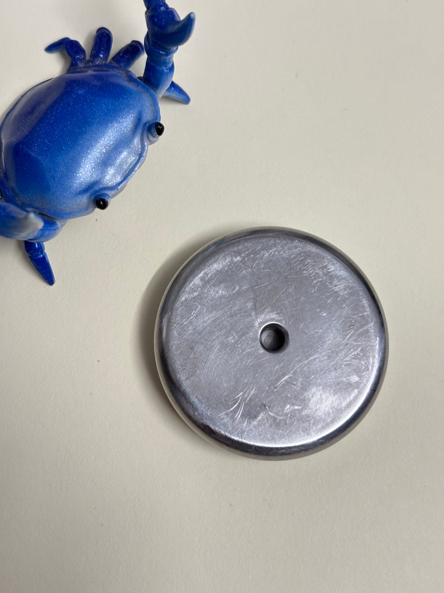 Umburry armored haptic coin - mid size speakerman SC / TI - haptic coin - fidget toy