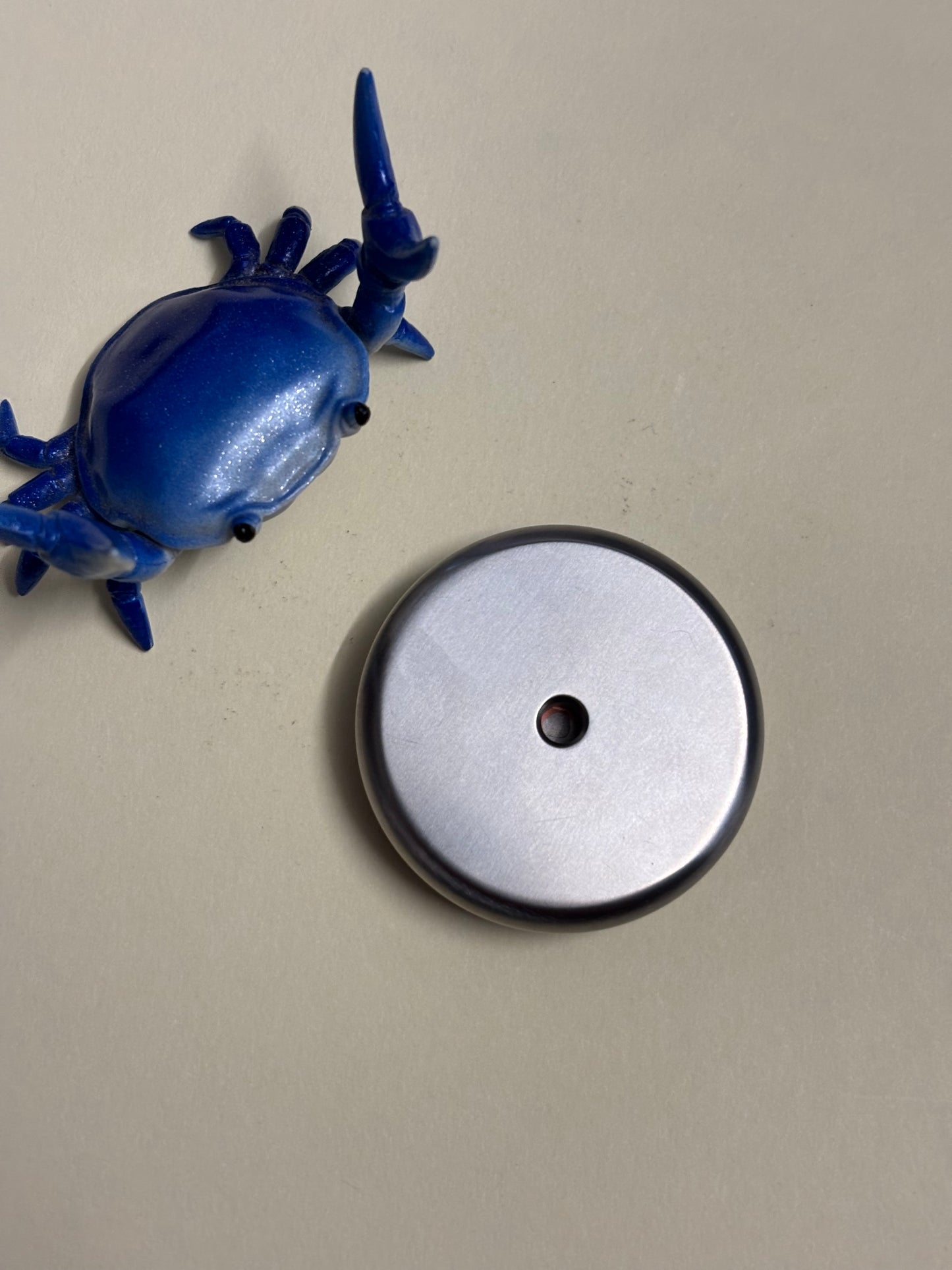 Umburry armored haptic coin - mid size speakerman super conductor / TI - haptic coin - fidget toy