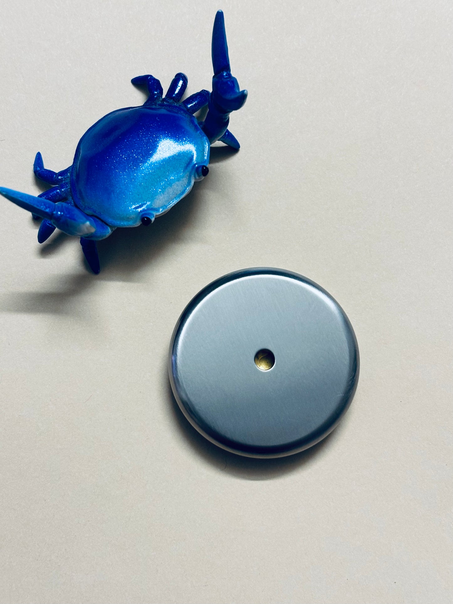 Umburry armored haptic coin - mid size ti/brass- haptic coin - fidget toy