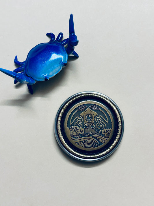 Umburry armored haptic coin - full size ti/brass- haptic coin - fidget toy