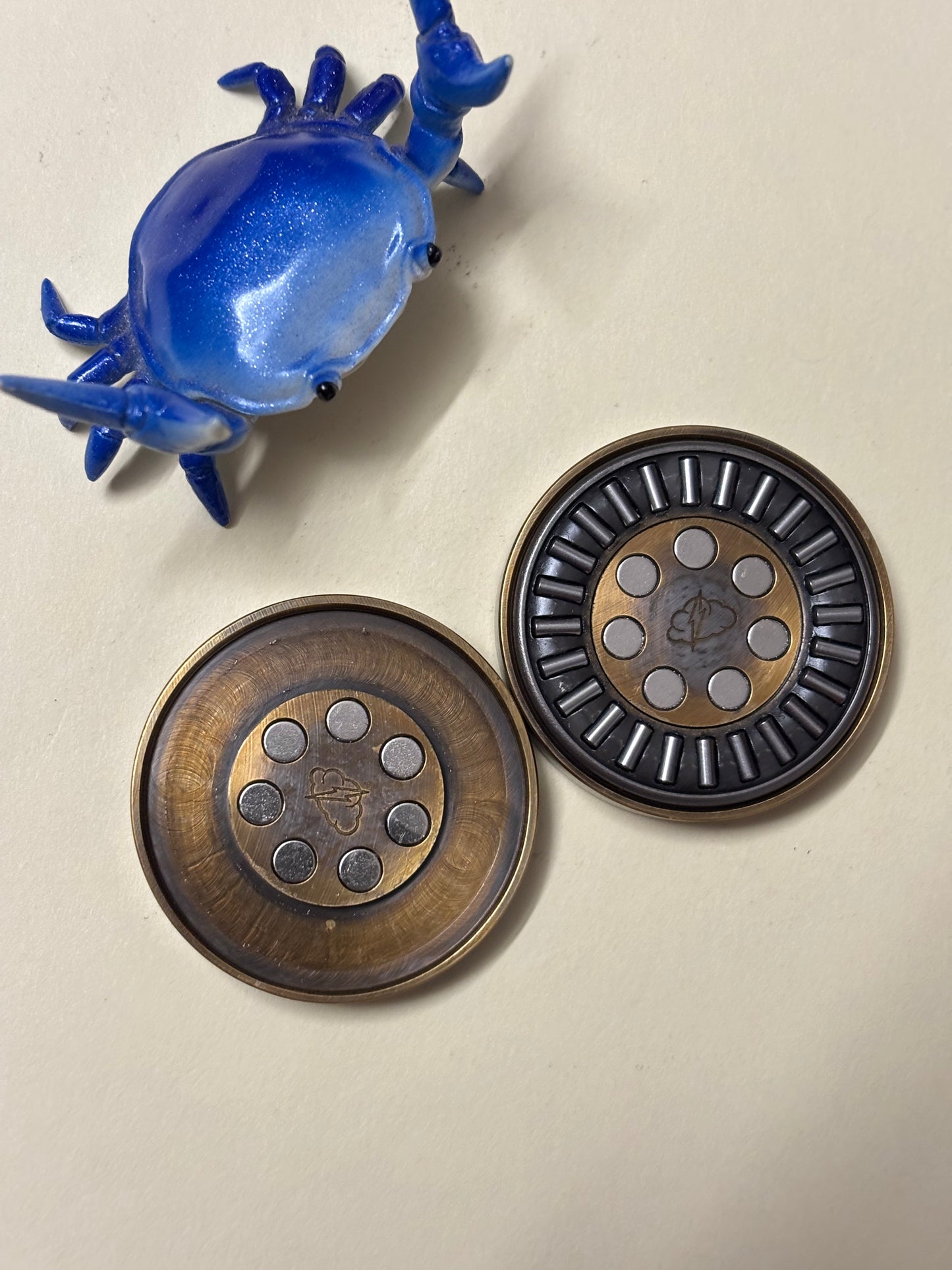 Black cloud creation haptic coin - brass monkey tail - haptic coin