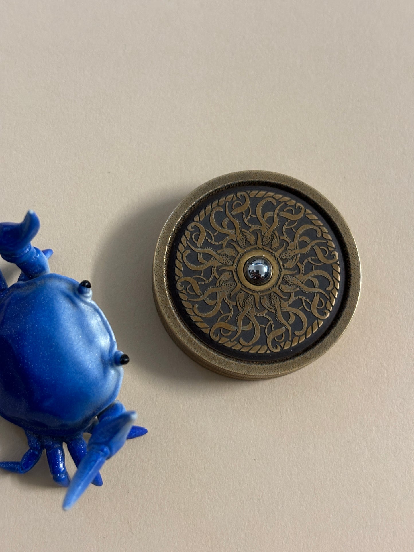 Umburry - brass - water - full size - haptic coin - fidget toy