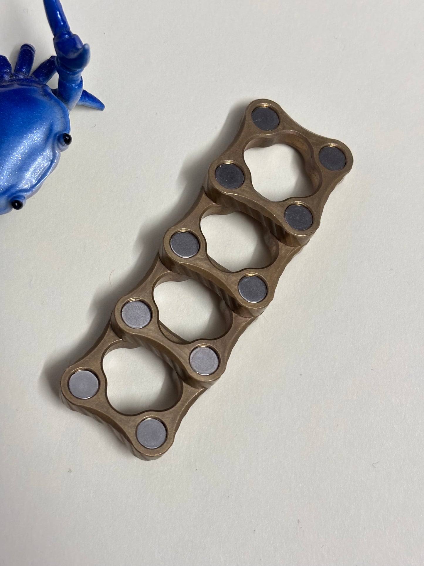 Bruce charles - micro stackable - brass -fidget toy