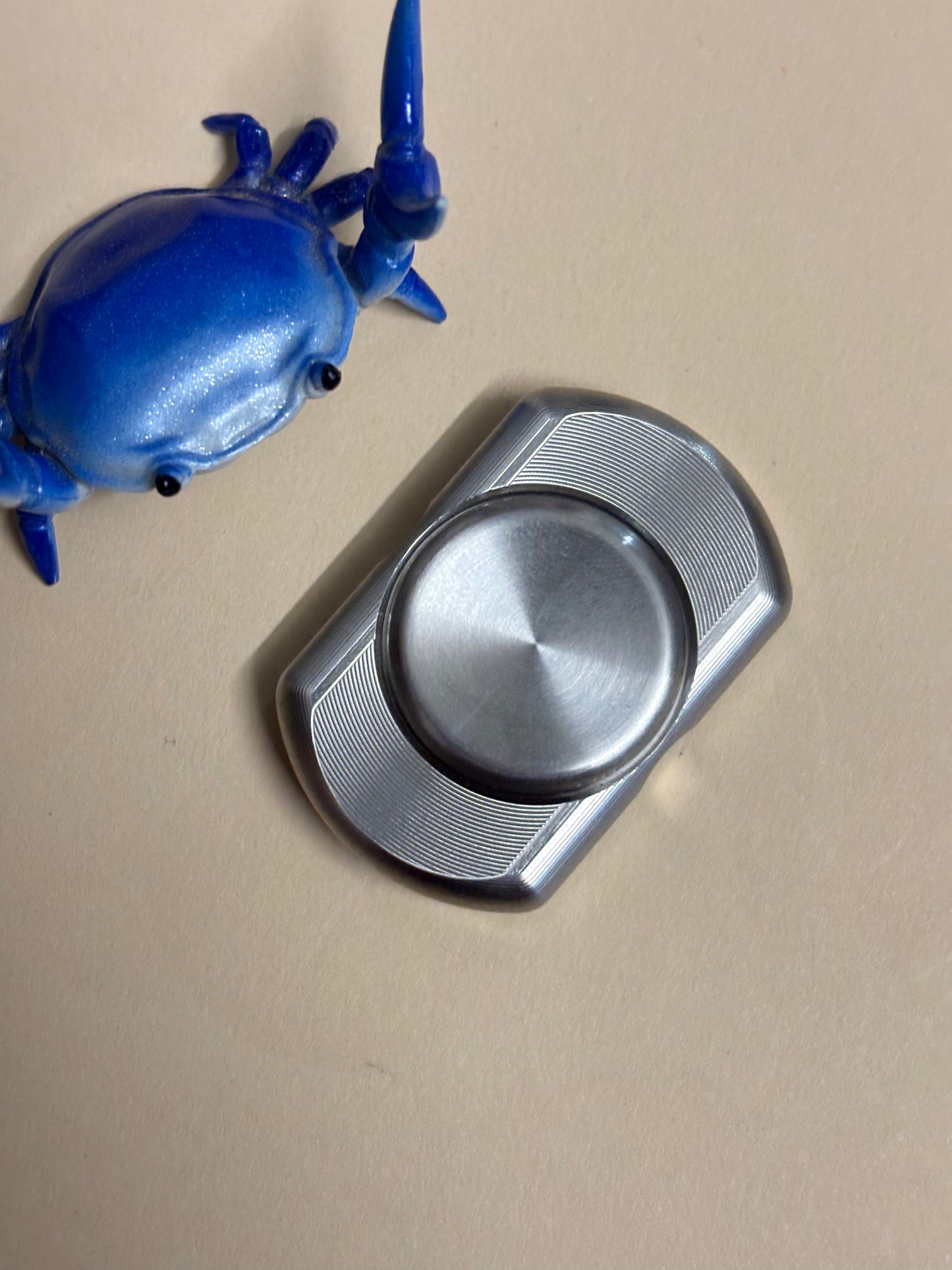 UQH - Pavilion - TI - fidget spinner - Fidget toy