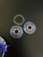 Umburry - crystal titanium redux - midsize - haptic coin - fidget toy