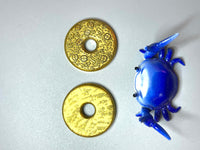 Umburry deathnut - brass - haptic coin