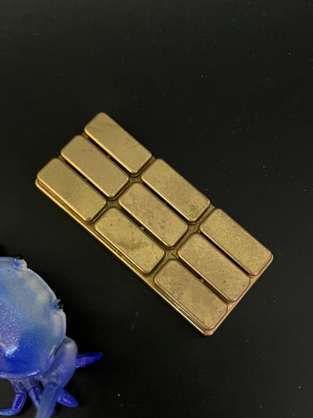 UQH - rocker plus in brass - Fidget toy